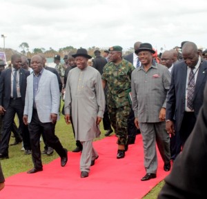 President Goodluck Jonathan flanked by Governor Emmanuel Uduaghan of Delta State (L), Governor Willie Obiano of Anambra (R)