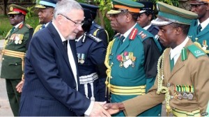 Zambia's Vice-President Guy Scott (L) greets defence and security chiefs;  Photo Credit: BBC NEWS
