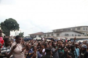 Crowed Jubiliating as Mokwe`s Hotel is Demolished PHOTO CREDIT: Valentine Obienyem